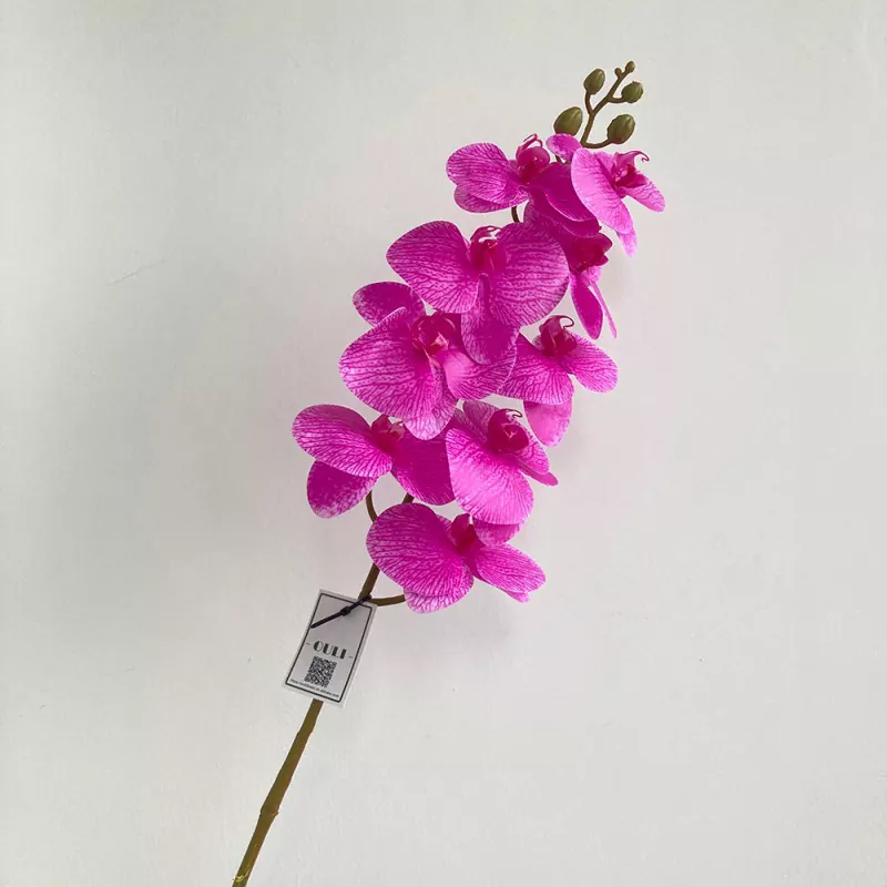 pink faux orchid flower arrangement 