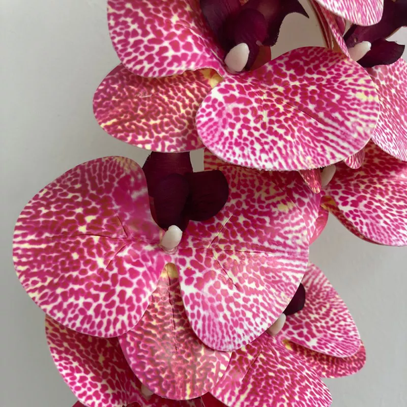 lush silk phalaenopsis orchid in pot 